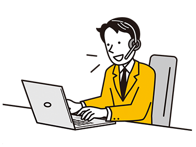 PCを操作しながら会話する男性